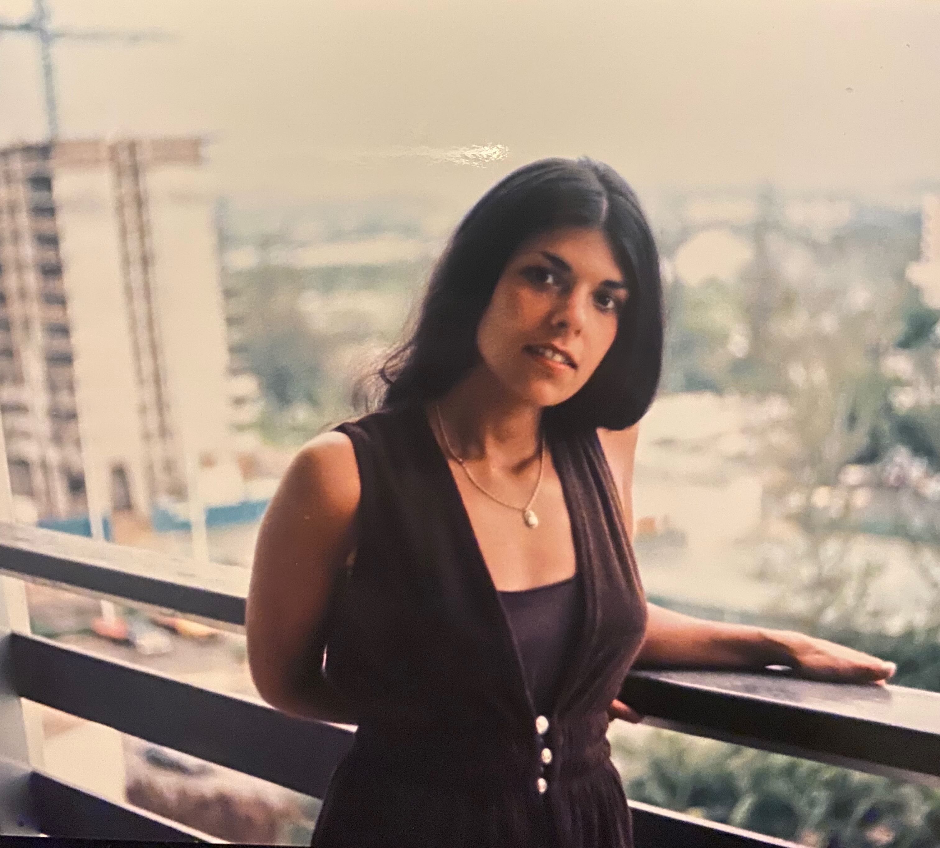 Lucy on a balcony
